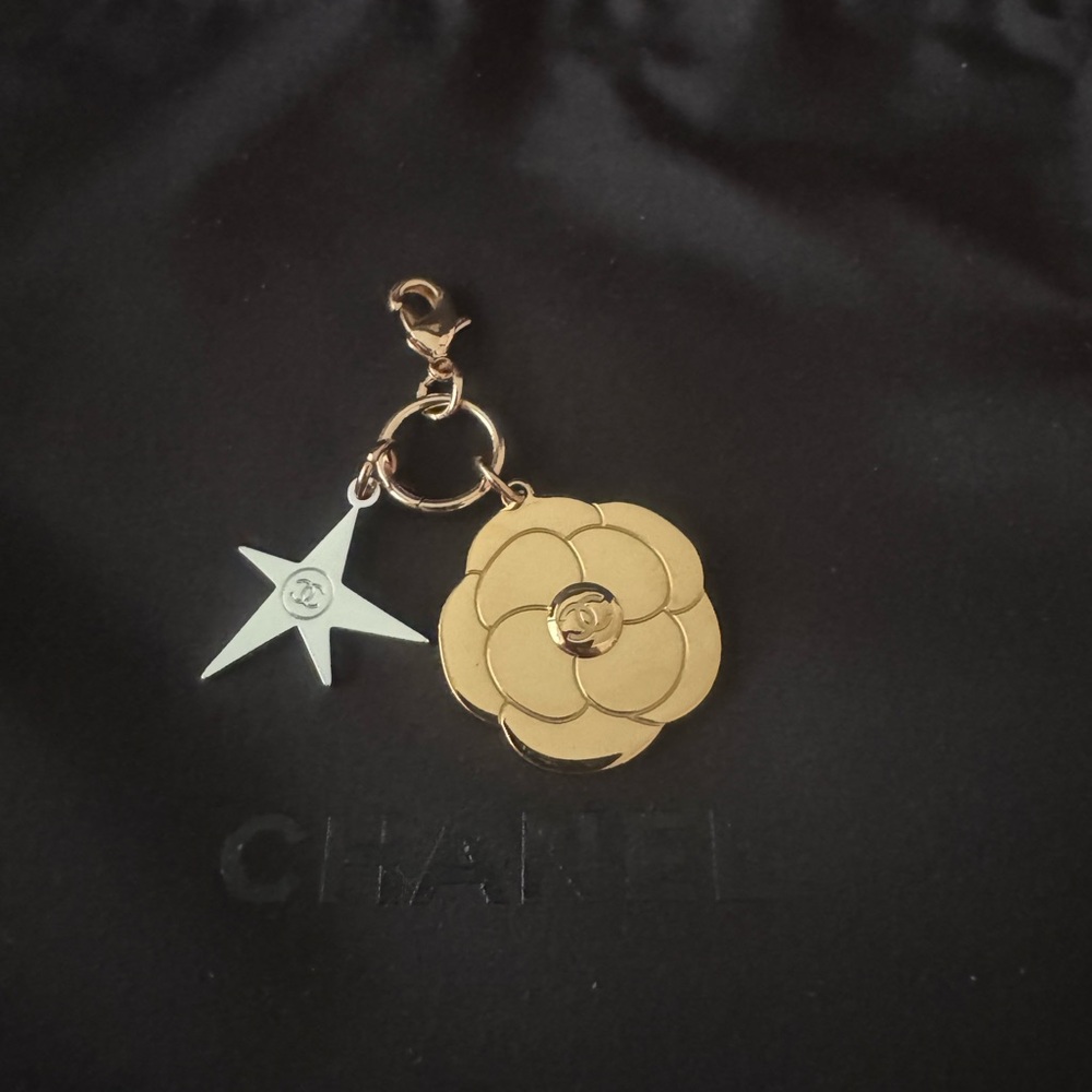CHANEL Makeup Line Gift Gold Floral and Silver Star Charm